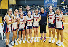 SUCCESS: Horsham’s under-18 girls squad celebrates its grand final victory at the Basketball Victoria Junior Country Championships after an undefeated run.