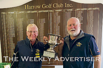 SUCCESS: Wimmera team captain David Baker and Harrow Golf Club president Ian Hair.