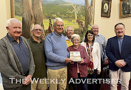 HISTORY: From left, Stawell Historical Society’s Jim Melbourne and Greg Robson, author David Hutchings, the historical society’s Dorothy Brumby, authors Tim Hutchings and Liz Bell and Northern Grampians shire councillors Kevin Erwin and Rob Haswell. Author Murray Hutchings was absent.