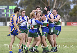 PROUD: Riley Vivian’s Kaniva-Leeor United team-mates congratulate him after kicking a goal in his first senior game. Picture: PAUL CARRACHER