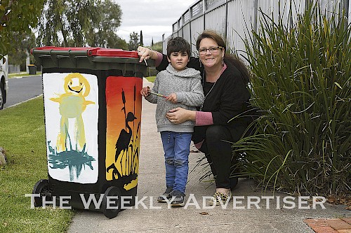 Horsham resident Kate Wade and her son Astin, 4, with their painted bin.
