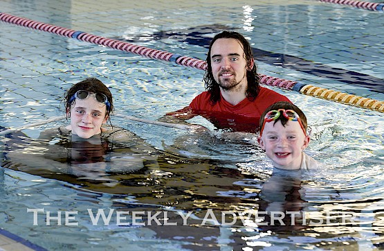 Mia, 11, and Connor, 7, Frawley enjoying swimming lessons at Horsham Aquatic Centre with instructor Adam Cannon. Swimming lessons have been reintroduced at the centre.