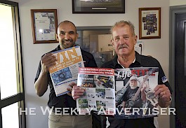 Mark Sulic congratulates Russell Bird for winning at TV in a Lifestyle Wimmera promotion.