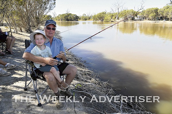 QUALITY TIME: Garry Lamb and grandson Thomas Schneider enjoy some family time during the Jeparit Easter Fishing Competition at the weekend.  Pictures: PAUL CARRACHER
