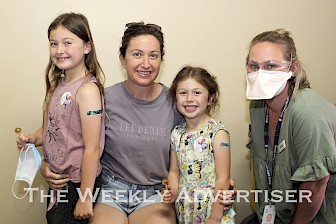 Leni, Stephanie and Eve Johnstone and celebrate getting vaccinated with Emma Hamilton.